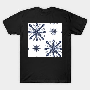 Pattern of blue snow crystals on white T-Shirt